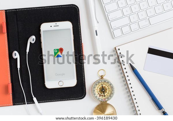 CHIANGMAI,THAILAND - MAR 01, 2016 : Google Maps\
screen of Apple iPhone 6s display on leather case on office desk\
luxury project. Google Maps free cartographical service of the\
Google\
company.