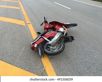 ChiangRai, Thailand - August 7, 2016:  Red Honda Wave 125cc Motorcycle  Got An Accident And Crash Down With Witness 