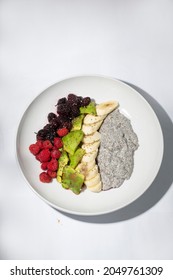 chiaseed pudding with banana, avocado, blackberry, and raspberry. healthy food with white background. isolated.