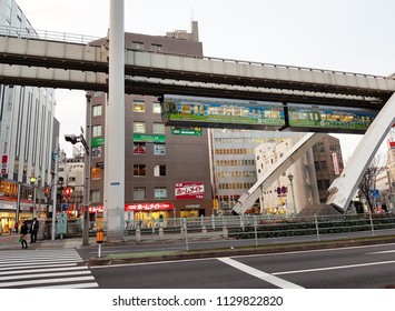 Chiba, JP - DECEMBER 30, 2017: The Chiba Urban Monorail Train That Cruising Over Traffic On A Main Road In Central Chiba City.