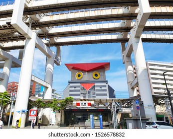 Chiba, JP - OCTOBER 7, 2019: The Chiba Urban Monorail Structure That Build Over The Owl-shaped Police Station In The Central Chiba City.