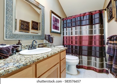 Chic Bathroom Design Features Vanity Cabinet With Granite Counter And Bright Colorful Shower Curtain. Northwest, USA