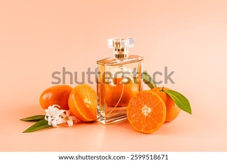 A chic bottle with a crystal cap with eau de parfum or perfume stands among ripe tangerines. feminine and masculine essence. Product Presentation.