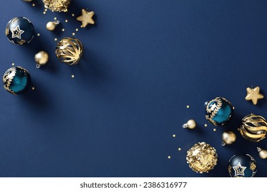 Chic Christmas composition with gold bauble, blue background, and elegant design - Festive holiday card concept - Powered by Shutterstock