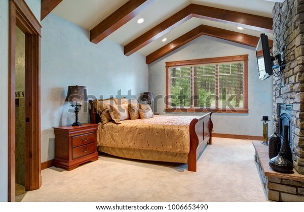 Chic Master Bedroom Vaulted Ceiling Wooden Stock Photo Edit