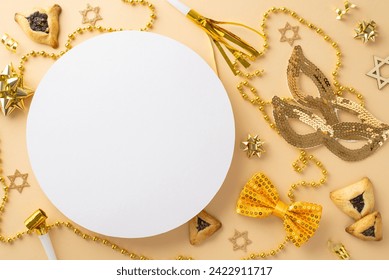 Chic Purim announcement featuring overhead shot of hamantaschen, Star of David decorations, golden masquerade masks, bow tie, and party favors on a neutral background with circle for your message - Powered by Shutterstock