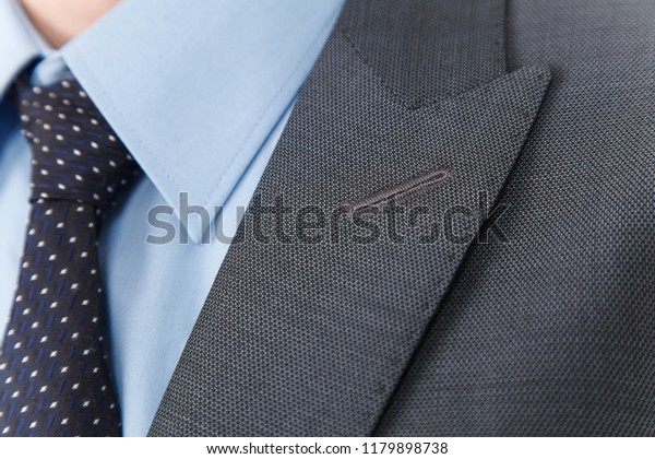 Chic and stylish suit, fashion\
background / Button suit stripe / Business,\
neckline.