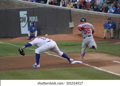 CHICAGO - APRIL 25: Carlos Beltran Of The St. Louis Cardinals Runs To First Base Against The Chicago Cubs At Wrigley Field On April 25, 2012 In Chicago, Illinois.