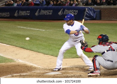 CHICAGO - APRIL 25: David DeJesus Of The Chicago Cubs Prepares To Hit A Ball Against The St. Louis Cardinals At Wrigley Field On April 25, 2012 In Chicago, Illinois.