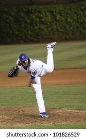 CHICAGO - APRIL 25: James Russell Of The Chicago Cubs Pitches Against The St. Louis Cardinals At Wrigley Field On April 25, 2012 In Chicago, Illinois.