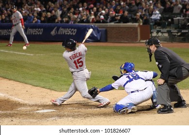 CHICAGO - APRIL 25: Rafael Furcal Of The St. Louis Cardinals Hits A Ball During A Game Against The Chicago Cubs At Wrigley Field On April 25, 2012 In Chicago, Illinois.