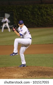 CHICAGO - APRIL 25: Shawn Camp Of The Chicago Cubs Pitches Against The St. Louis Cardinals At Wrigley Field On April 25, 2012 In Chicago, Illinois.