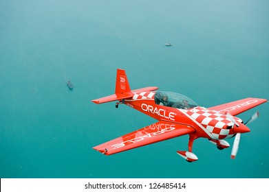 CHICAGO - AUGUST 16: Sean Tucker of Team Oracle flies over Lake Michigan during the Chicago Air and Water Show Media Day on August 16, 2012 in Chicago.