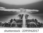 Chicago Buckingham fountain in Grant Park in the morning with cloud and blue sky.