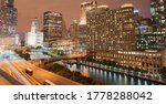 Chicago buildings, towering from street level around Chicago River and urban roads, Columbus Drive Bridge and street light streams Looking from east side to north and high-rise apartments, hotels 