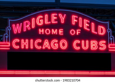 Chicago - Circa May 2021: Wrigley Field Home of Chicago Cubs in red neon lights with copy space. Wrigley Field has been home to the Cubs since 1916.