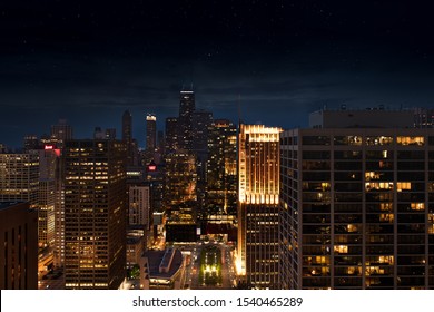 Chicago City Skyline Neighborhood With A Clear Night Sky Brightly Lit Up