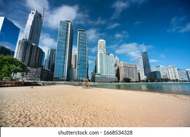 Chicago Cityscape Across The Sand Of Ohio Street Beach On Lake Michigan And Lake Shore Drive In Illinois USA