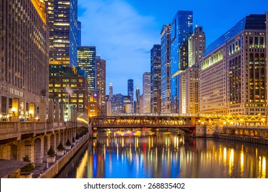 Chicago Downtown And Chicago River At Night.