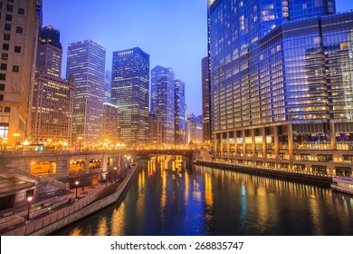 Chicago Downtown And Chicago River At Night.