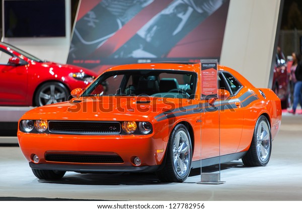 CHICAGO - FEBRUARY 8 : A 2014 Dodge Challenger\
on display at the Chicago Auto Show media preview February 8, 2013\
in Chicago, Illinois.