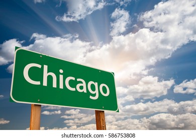 Chicago Green Road Sign Over Dramatic Clouds And Sky.