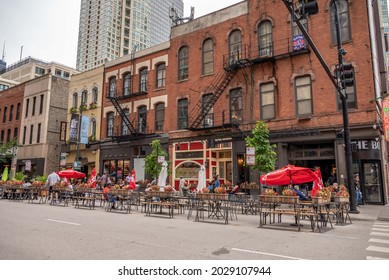 Chicago, IL - August 1, 2021: People Dine Out In The Street On Clark, In River Downtown, In Summer.