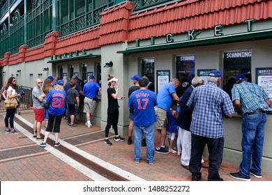 Chicago, IL - August 22, 2019: Fans Stand In Front Of The Ticket Booth At Wrigley Field Before A Chicago Cubs Baseball During A Beautiful Summer Day.                     