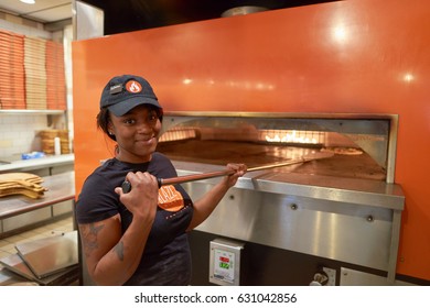 CHICAGO, IL - CIRCA MARCH, 2016: Indoor Portrait Of A Worker At Blaze Pizza Restaurant. Blaze Pizza LLC Is A Pasadena, California-based Chain Within The Fast-casual Dining Restaurants Category.