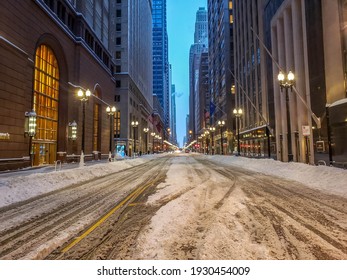 Chicago, IL February 16, 2021, LaSalle Street In The Downtown Loop Business District Covered In Snow After A Winter Snowstorm