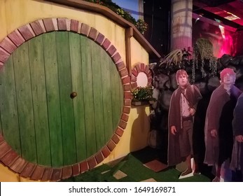 Chicago, IL February 9, 2020, Replay Lincoln Park Bar And Arcade, The Lord Of The Rings Round Hobbit House Door And Frodo Baggins And Samwise Gamgee Statues On Display