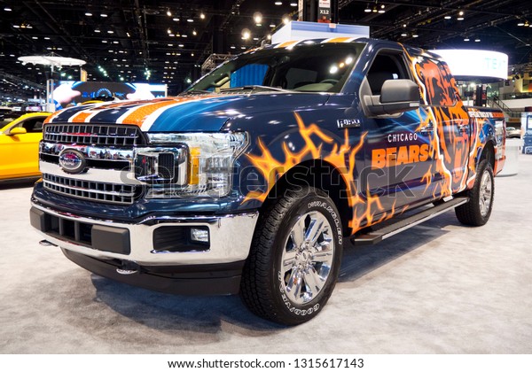 CHICAGO, IL - FEBRUARY 9: Chicago Bears Ford F150\
pickup at the annual International auto-show, February 9, 2019 in\
Chicago, IL
