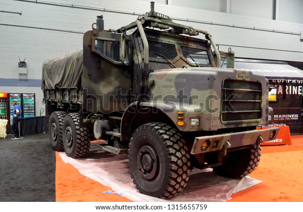 CHICAGO, IL - FEBRUARY 9: Military heavy-duty truck at\
the annual International auto-show, February 9, 2019 in Chicago,\
IL
