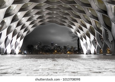 Chicago, IL - January 23, 2018: The People's Gas Pavilion Designed By Architect Jeanne Gang Arches Over The Building Skyline On A Still Winter Night In Chicago.