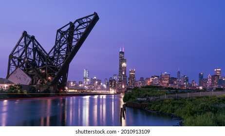 Chicago, IL - July 18 2021: View Of Downtown Chicago Skyline And Sears Tower At Night From Ping Tom Memorial Park In Chinatown