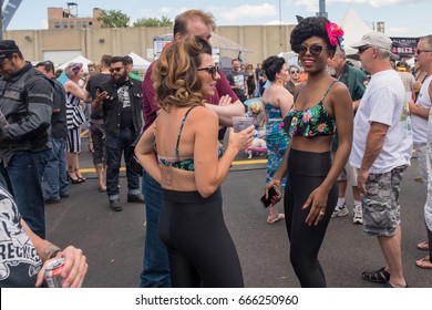 CHICAGO, IL, June 24, 2017: Beautiful Friends Hanging Out At A Summer Street Festival In West Town. Chicago Hosts Dozens Of Street Festivals Each Summer, All Across The City, With Some Every Weekend.