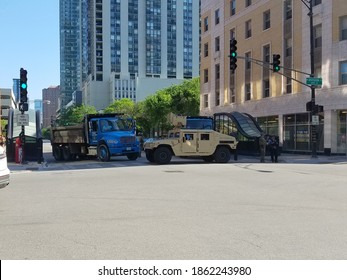 Chicago, IL June 2nd, 2020, Salt Truck And National Guard Troops And Humvee Blocking The Intersection Of Clark And Division In Chicago During The George Floyd Race Riots