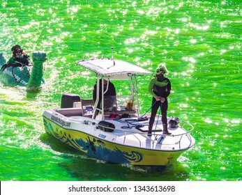 Chicago, IL - March 16th, 2019:  Kayak Chicago Makes Their Annual Appearance In The Dyeing Of The Chicago River On St. Patrick's Day With A Green Loch Ness Monster In Tow Ridden By A Leprechaun.