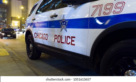CHICAGO, IL - MARCH 19: Police vehicle in front of building on Ohio Street in downtown city of Chicago, Illinois on March 19, 2018.