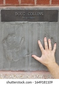 Chicago, IL September 19, 2019, Doug Collins Professional Basketball Player Hand Prints In Cement At The Chicago Sports Authority Wall Of Fame 620 North LaSalle Drive Compared To My Hand Size