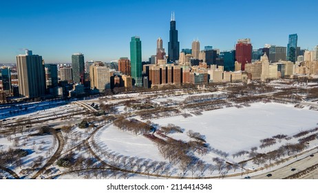 Chicago, IL USA- 01 28 2022: Aerial Drone Shot Of The Chicago Skyscraper Covered In Frozen Snow From The Recent Blizzards Happening In The City.