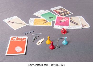 Chicago, IL / USA - April 5, 2020: Focus On The Die In A Close Up View Of The Pieces Of A Vintage Clue Game. Illustrative Editorial.
