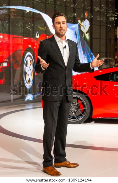 Chicago, IL, USA - February 7, 2019: Sage\
Marie - Asst. Vice President of PR at Honda giving a speech about\
30 years of NSX at the 2019 Chicago Auto Show.\
