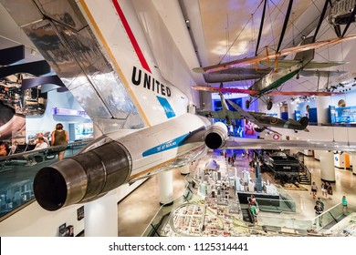 CHICAGO, IL, USA - JUNE 24, 2018: At The Museum Of Science And Industry, People, Can Explore The Inside And Out Of A United Airlines Boeing 727 With Hands On Experiences And Interactive Displays.