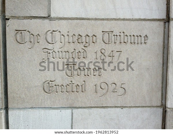 CHICAGO, IL, USA - JUNE 29 2013: Stone sign on\
Tribune Tower reads \