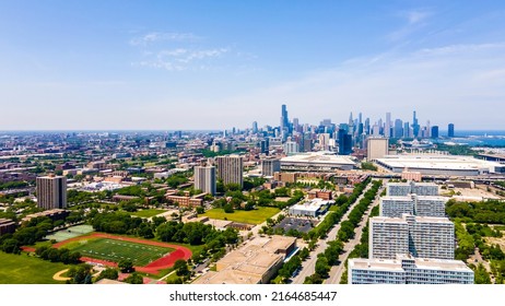 Chicago, IL USA June 5th 2022: Aerial Drone View Of A Chicago Neighborhood Downtown. The City Beautiful Architectural Is Also Covered By Lush Green Trees Throughout The Urban Cityscape