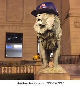 Chicago, IL / USA - November 8 2016: The Lion Statues Outside The Art Institute Of Chicago Don Cubs Hats In Celebration Of Their World Series Championship Win