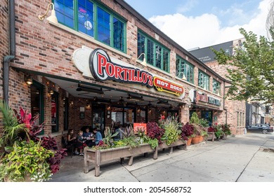 CHICAGO, IL, USA - OCTOBER 8, 2021: Portillo's And Bernelli's Are A Food Chain, Based Out Of Chicago, Known For Their Hot Dogs, Italian Beef Sandwiches, And Other Fast Food.