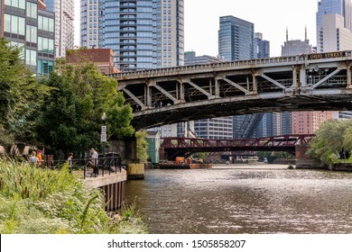 Chicago, IL / USA - September 15, 2019:  Scenic View Of People Overlooking The Chicago River, Under The Iconic Grand And Ohio Street Bridges.