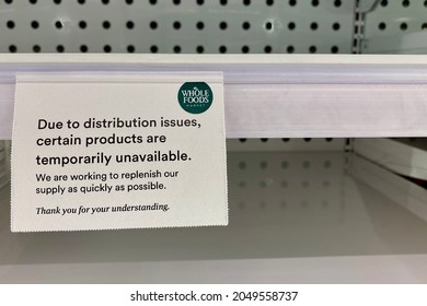 Chicago, IL, USA - September 26 2021: Signage On Freezer Shelf At Whole Foods Reminds Shoppers That Distribution Issues Have Caused Some Products To Be Temporarily Unavailable.